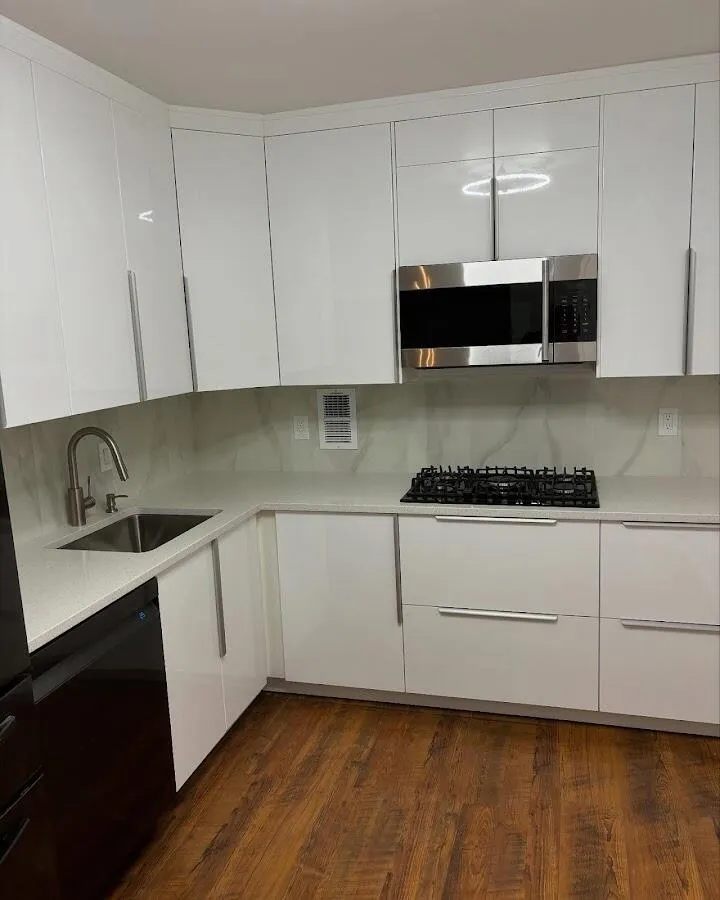 Restored kitchen with white cabinets after water damage in Ross